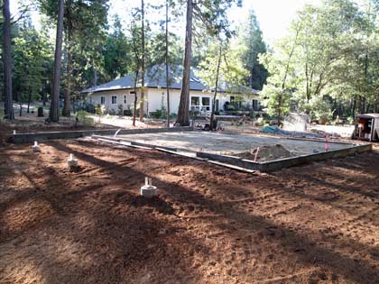 Foundation and finish grading complete. Decomposed granite in place.