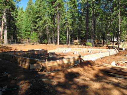 Concrete is poured, forms ready to be stripped