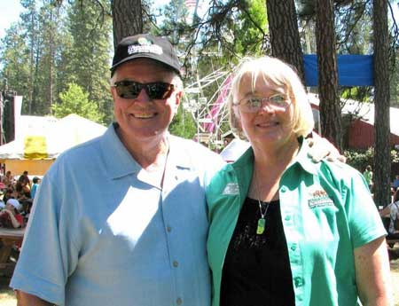 Huell Howser, founder and host of the PBS program California’s Gold, takes a moment to interview Sandy Woods, CEO of the Nevada County Fairgrounds. Howser visited the Nevada County Fair on Thursday to film an episode for a PBS series he is developing on “California’s Golden Fairs.”