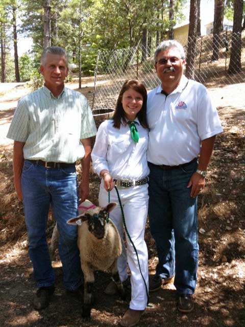 Preparing for the Junior Livestock Auction on Sunday of the Fair are (from left to right): Bear River Ag teacher, Steve Paasch; Paige Lambert, who is raising the Heritage Lamb for the Nevada County Fairgrounds Foundation; and Ed Mertens, Nevada County Fairgrounds Foundation Board Member. 